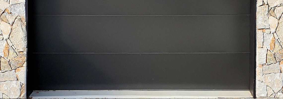 Overhead Black Garage Door Installation in The Villages, Florida
